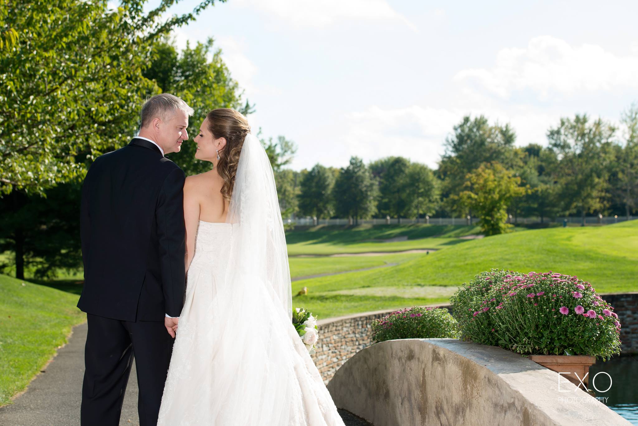 bride and groom from behind at Willow Creek Golf and Country Club