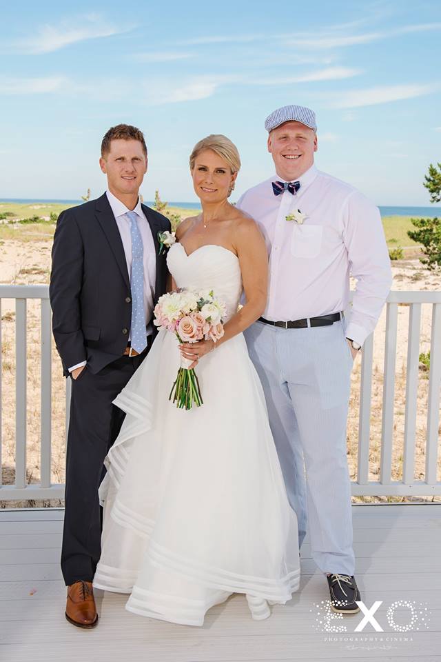 bride and family image outside Oceanbleu