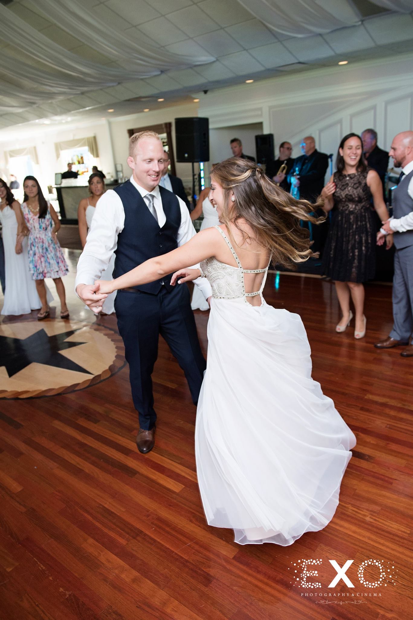 bride and groom dancing at reception