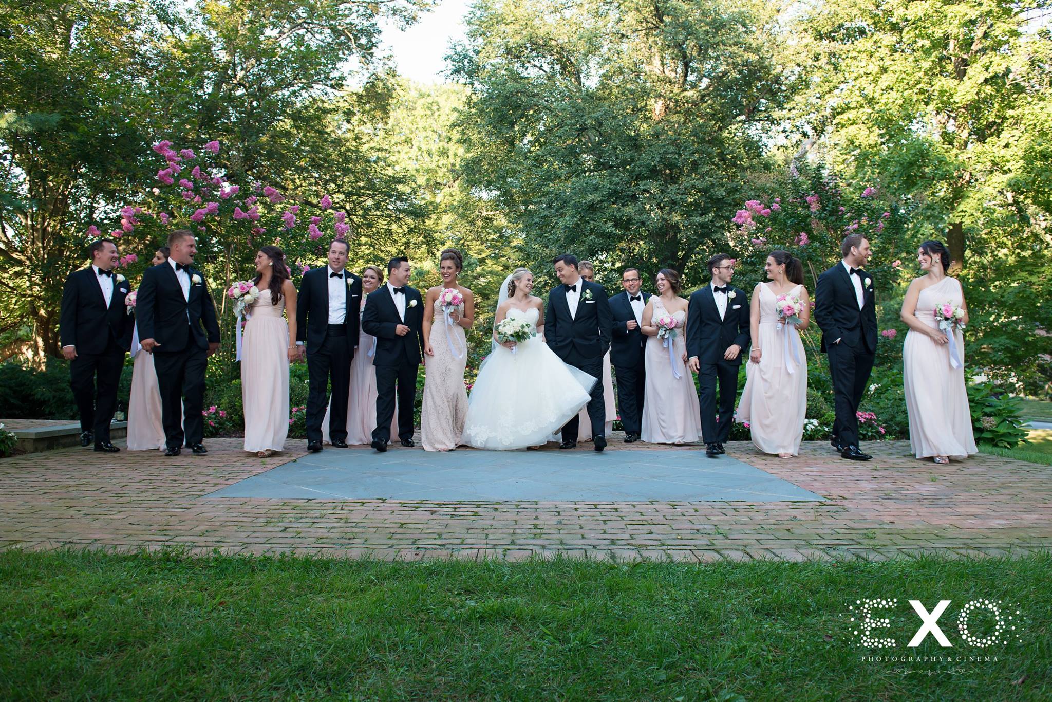 wedding party wearing dresses from bridal reflections and suits from mens warehouse