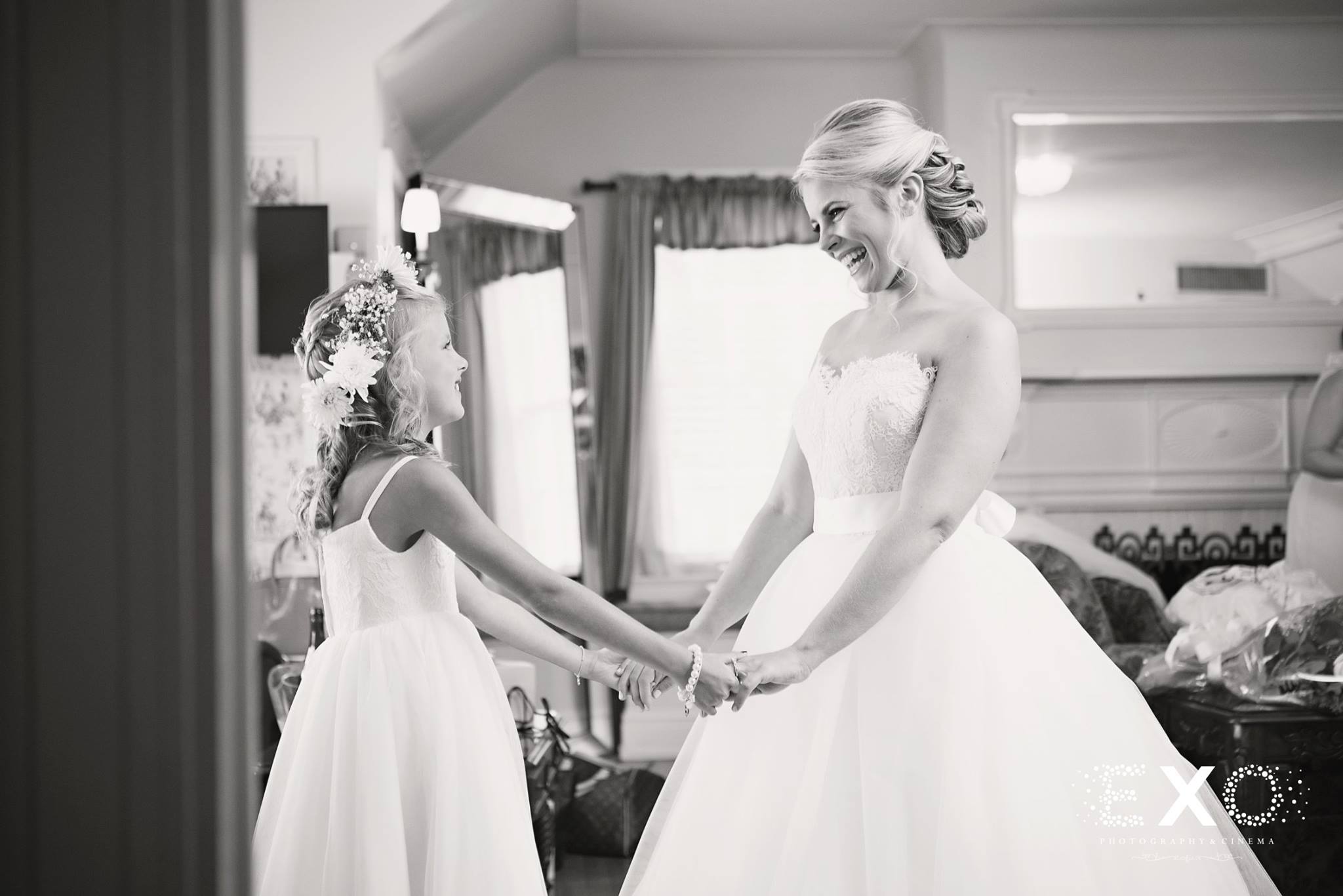 black and white image of bride and flowergirl