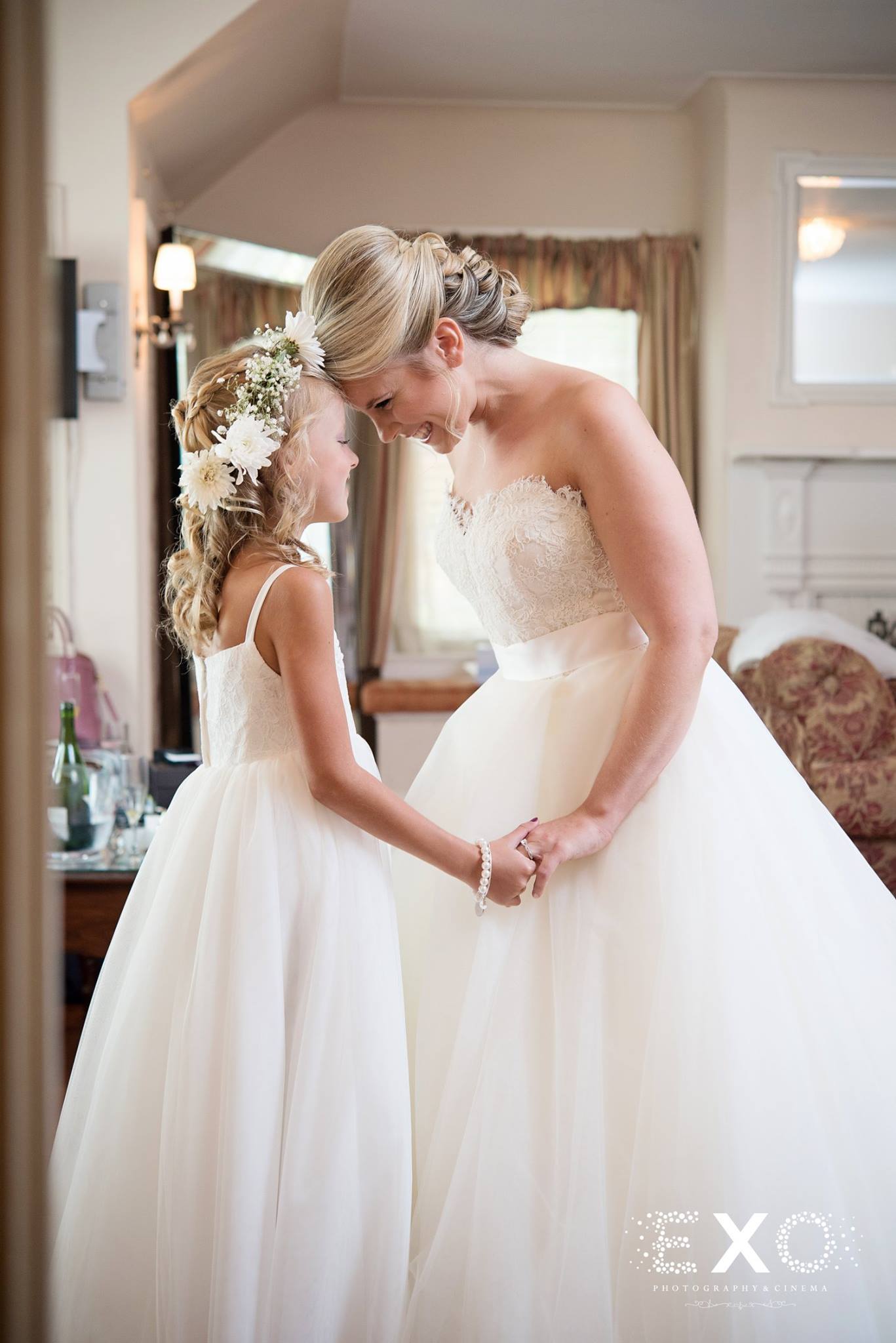 flower girl with bride wearing kleinfeld gown designed by lazaro perez