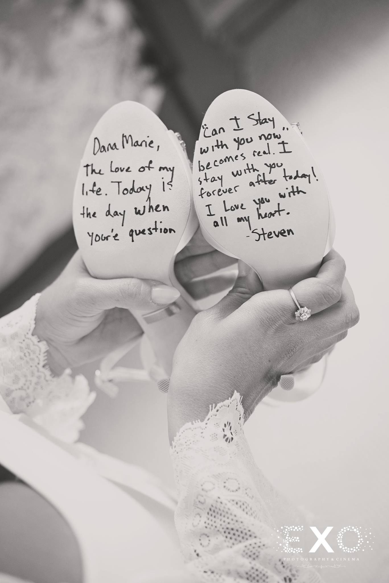 black and white image of brides shoes with written message
