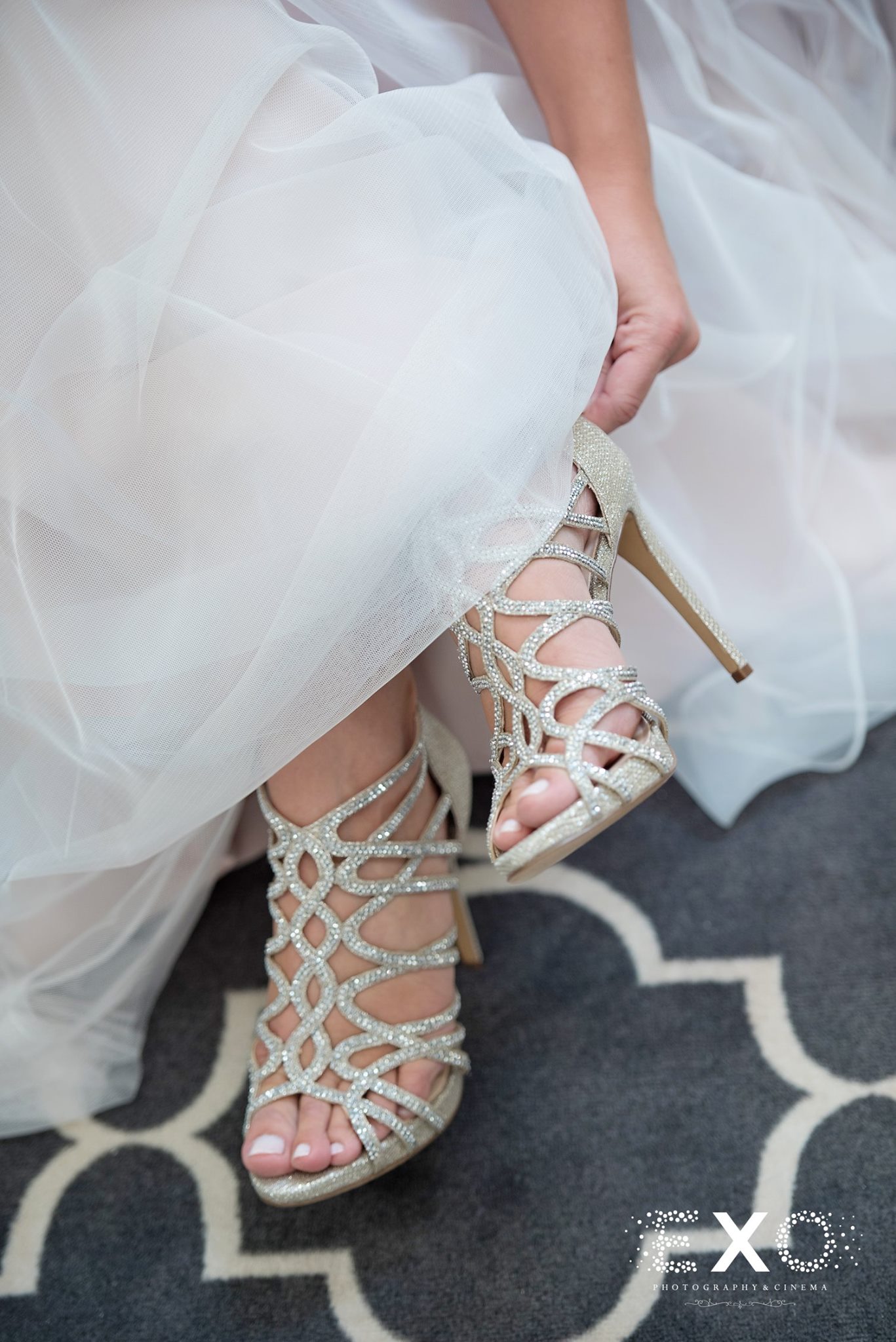 brides shoes and gown by kleinfeld bridal