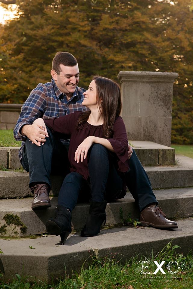 couple sitting on concrete steps
