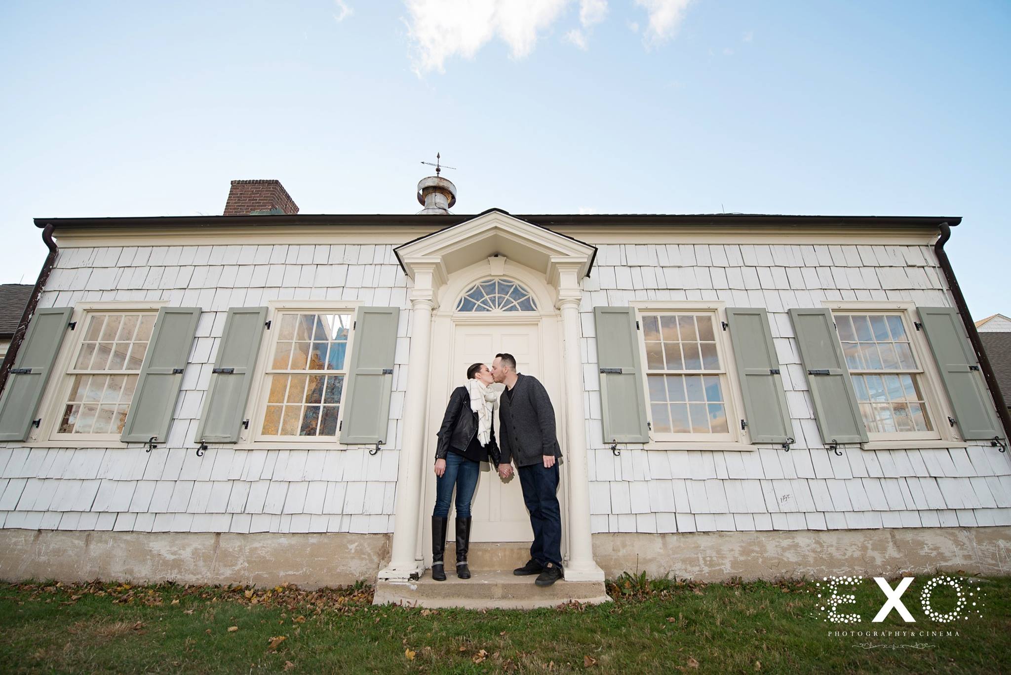 Couple in front of white building at Caumsett State Park