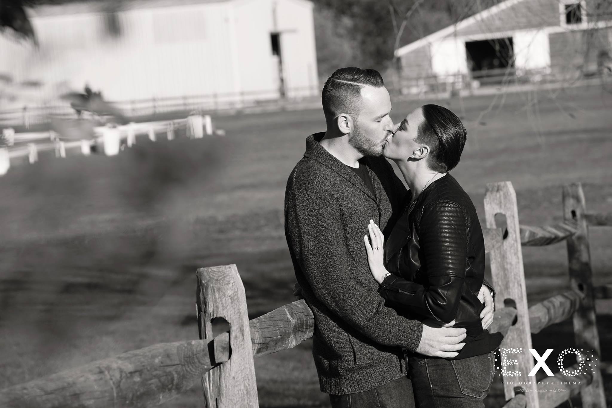 black and white image of kjell and nicole kissing