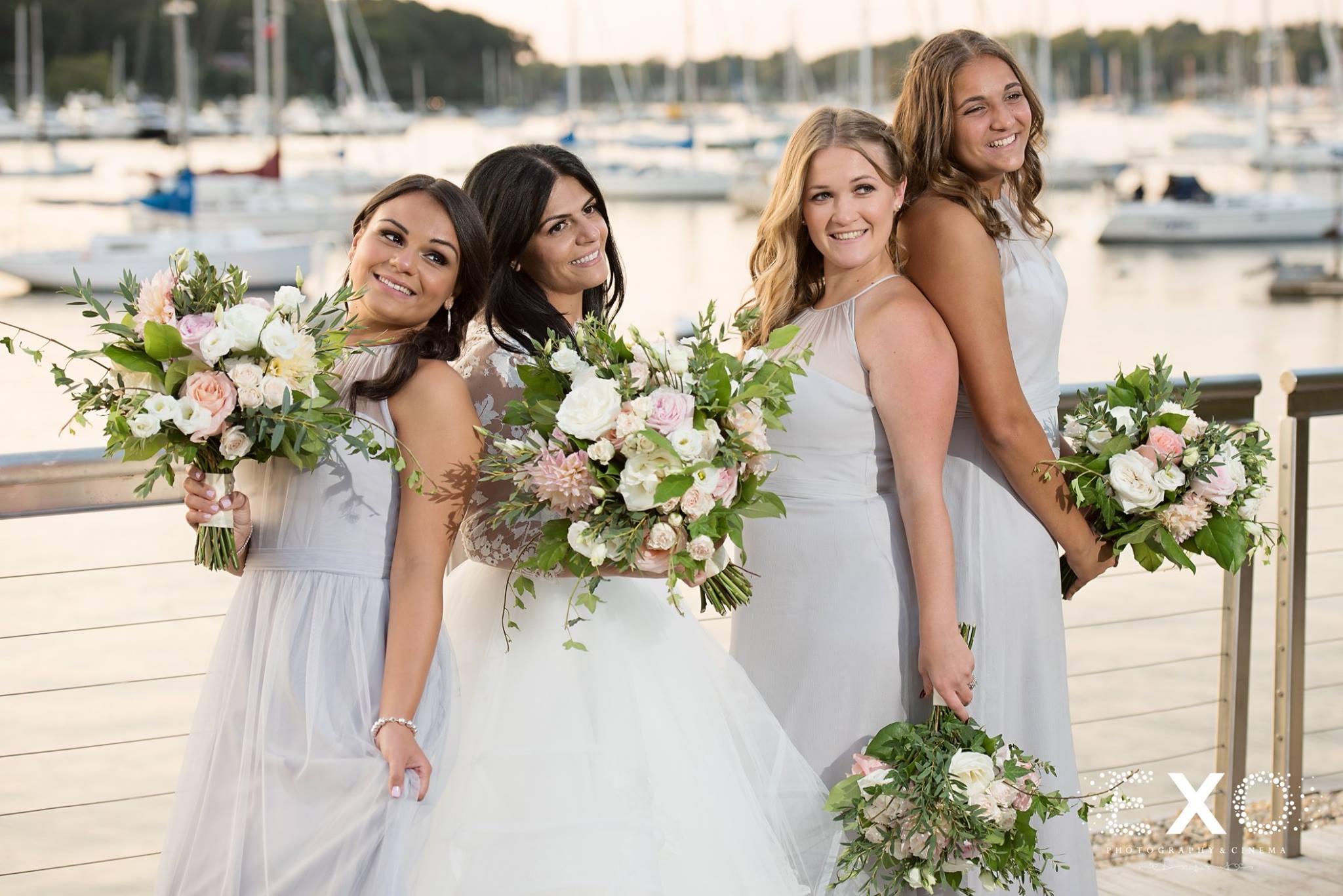 bride wearing kleinfeld bridal gown designed by hayley paige and bridesmaids wearing amsale- nordstroms wedding suite