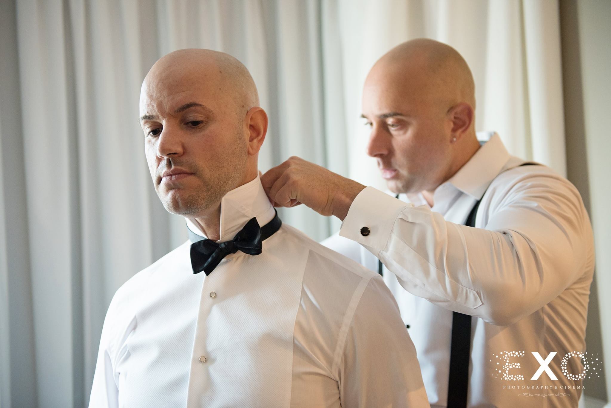 groom getting ready in Ralph Lauren/ Ralph Lauren Manhasset