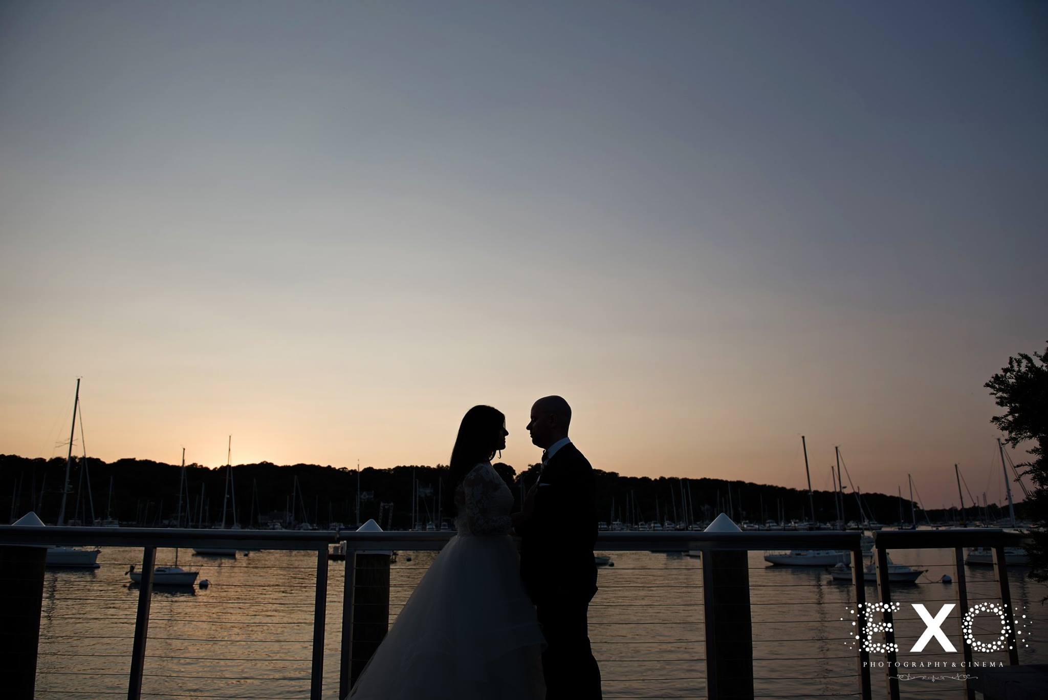 evening shot of bride and groom in low light sunset