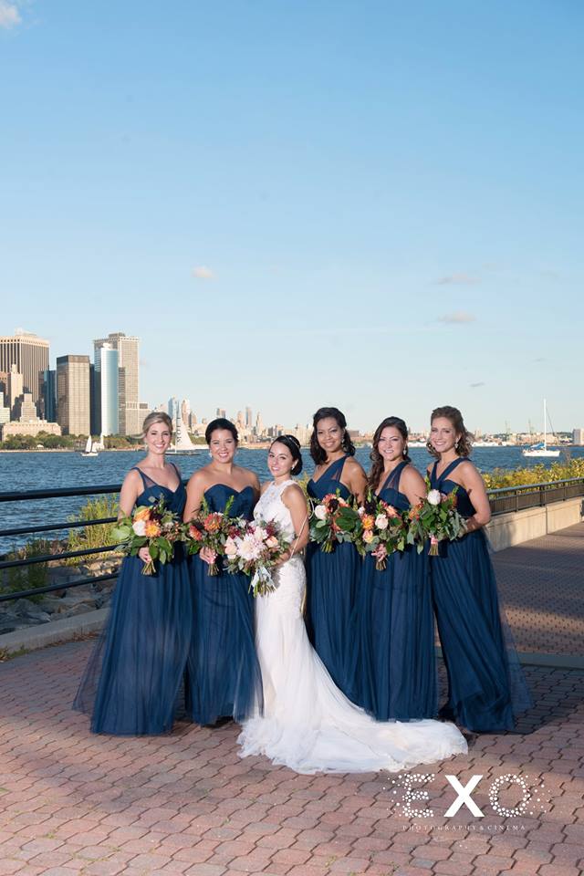 bride wearing Kleinfelds and bridesmaids wearing Too by waters by the water of Maritime Parc