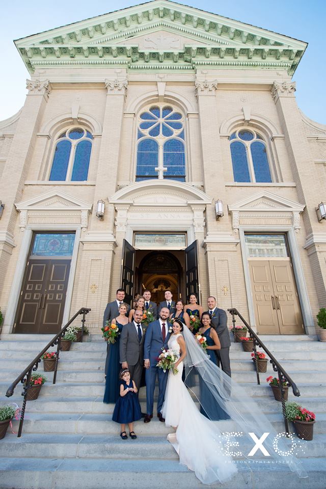 bride and groom and family outside st anna church
