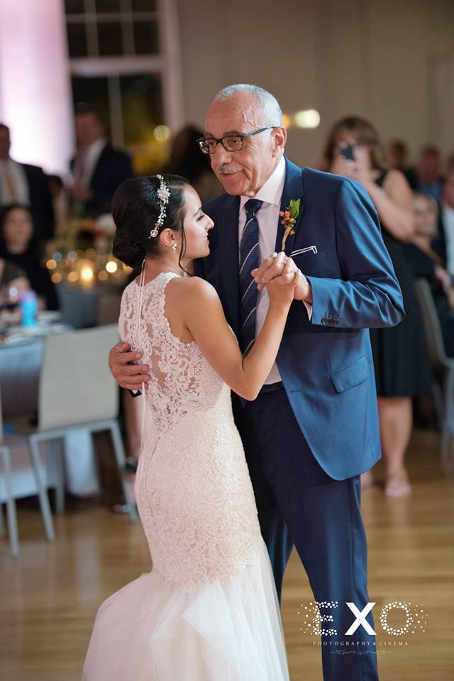bride dancing with father to music from absolute celebrations