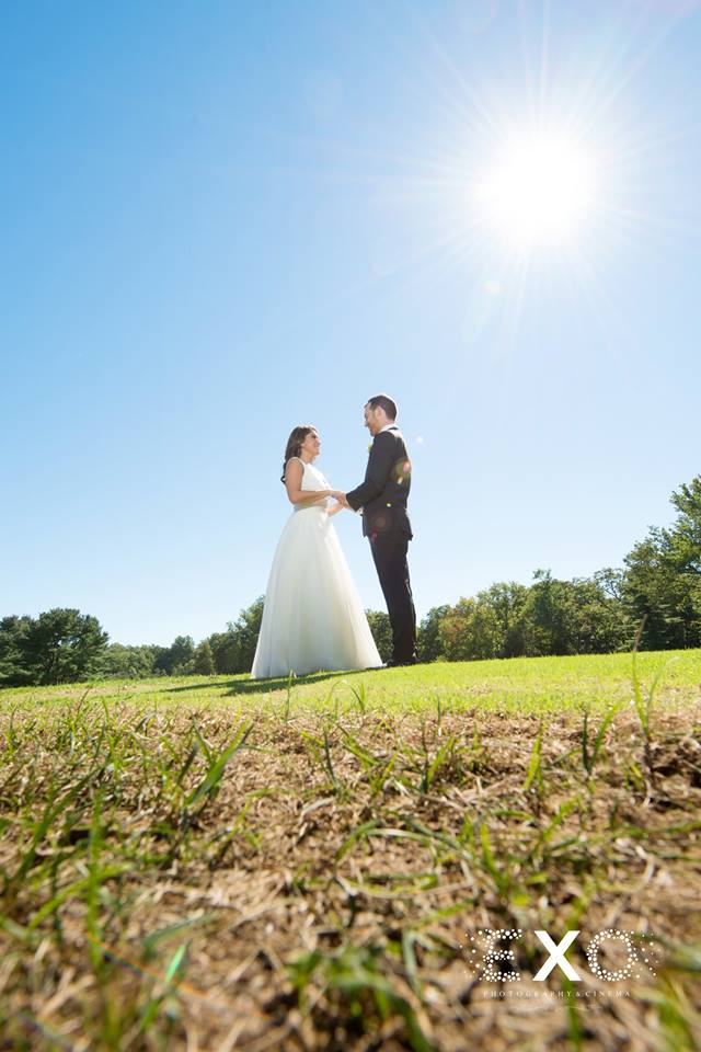 low perspective shot of bride and groom at stonebridge country club