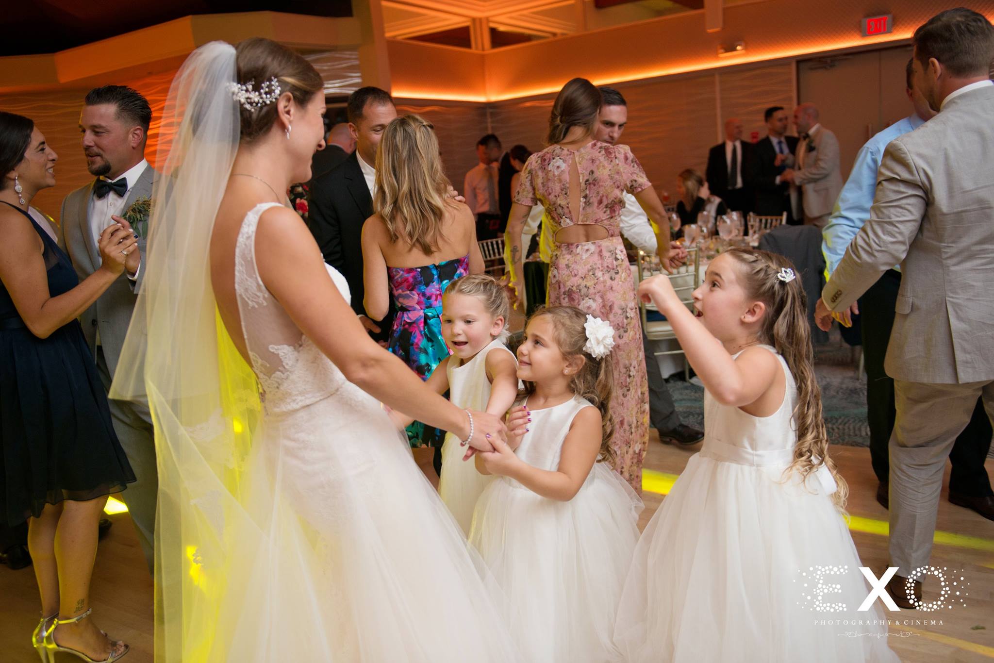 bride and little girls dancing