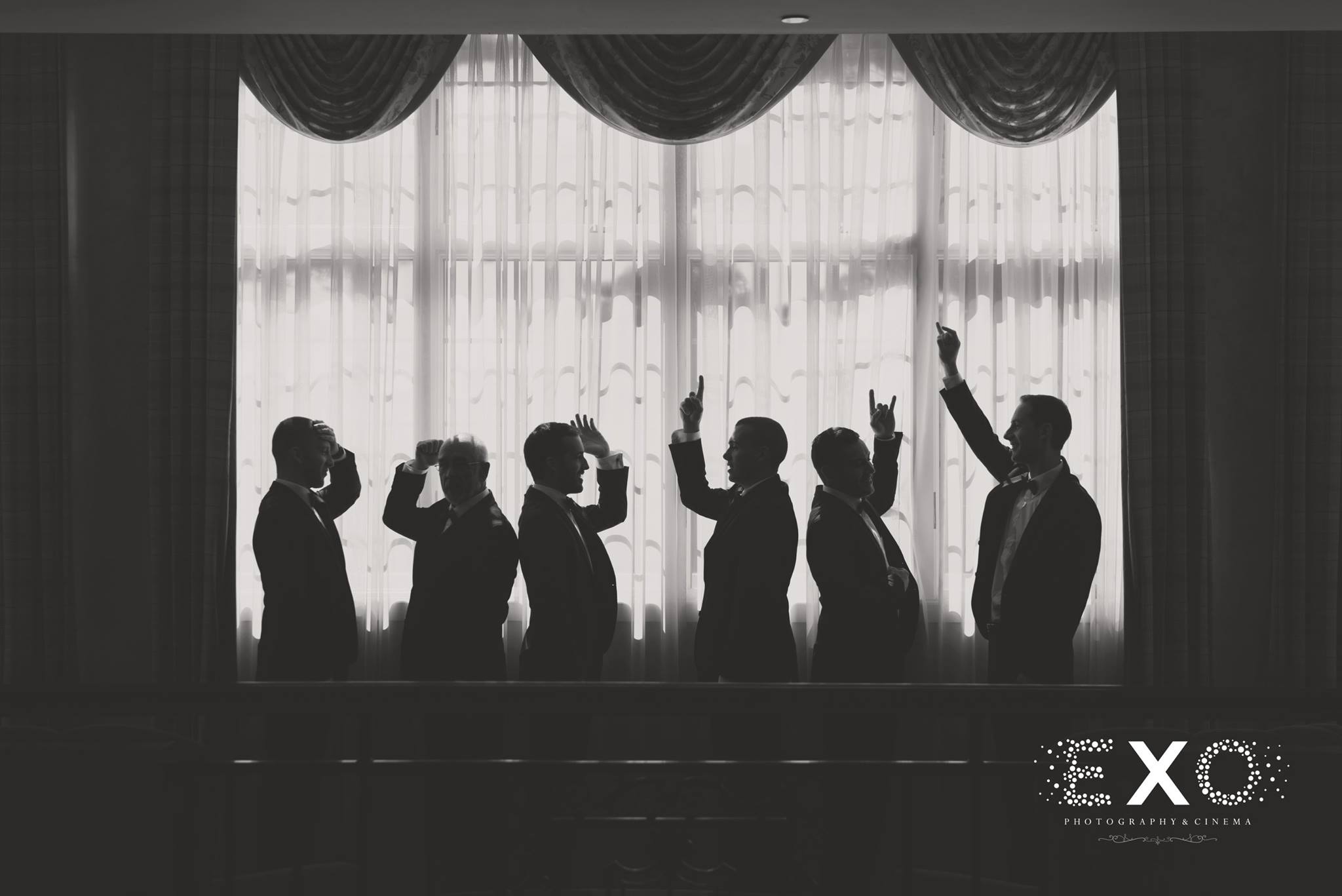 black and white picture of groom and groomsmen