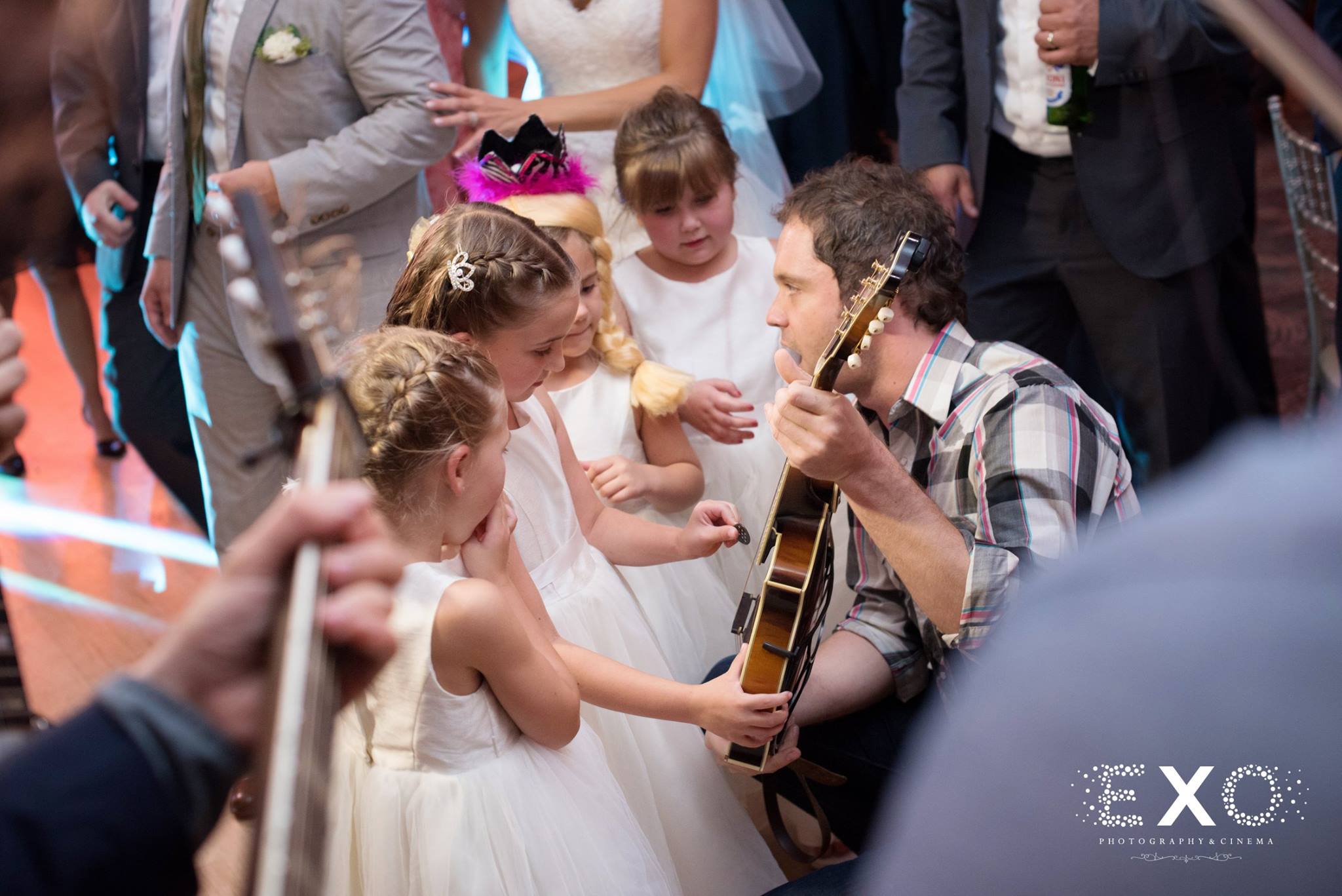 AGES events music playing with young wedding guests