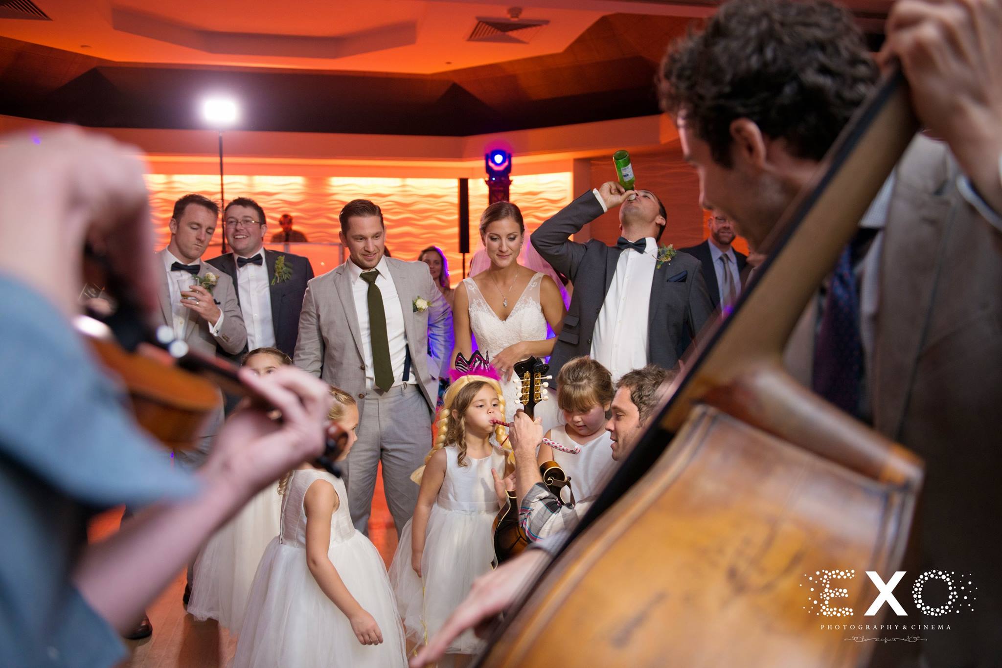 wedding guests playing band instruments 