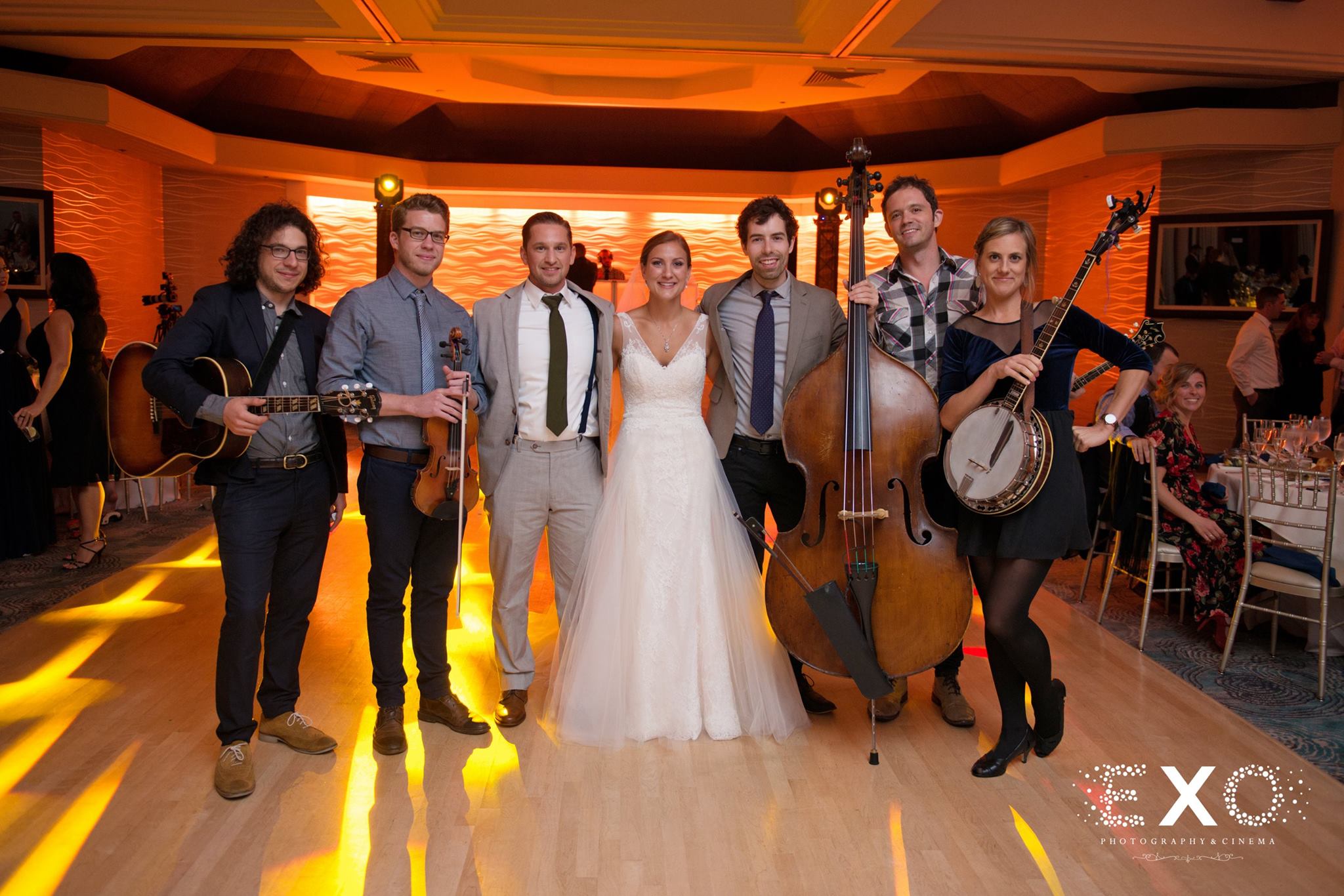 bride and groom with AGES events band