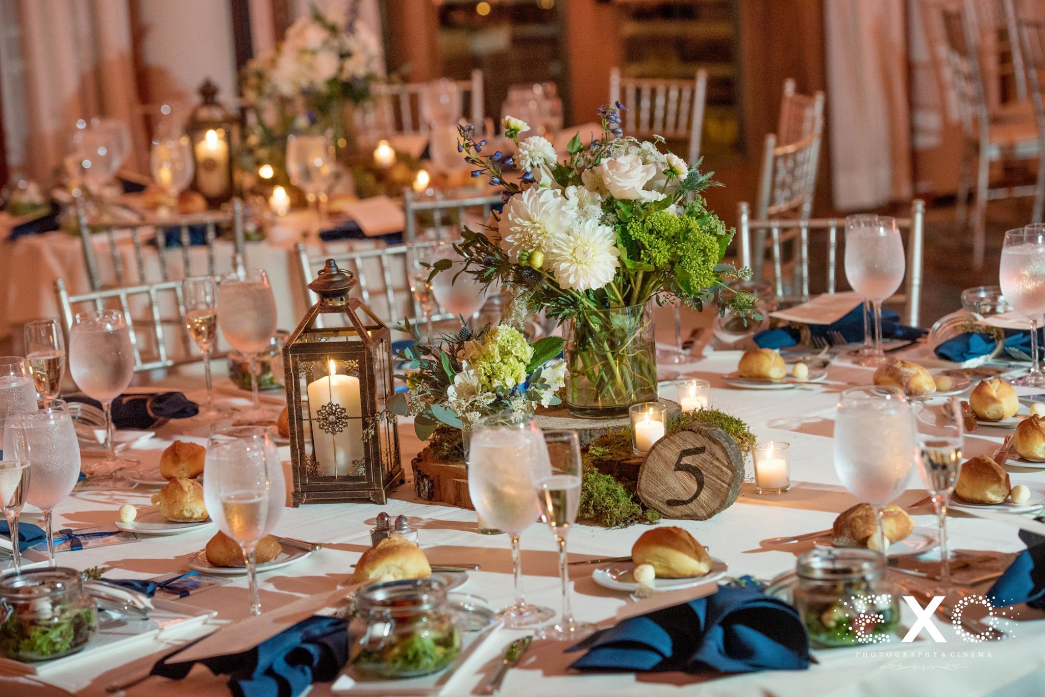 reception table setting with flowers by Nicole Troncone
