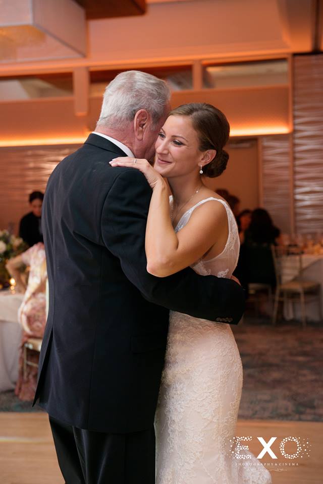 bride dancing with father at crescent beach club reception