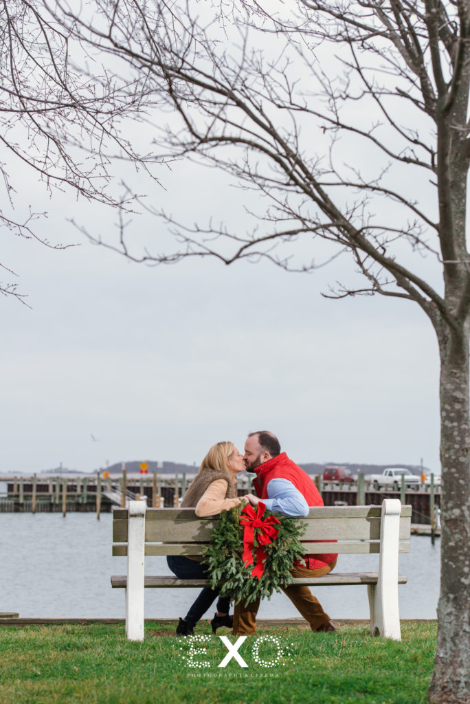 Couple on a bench by the water