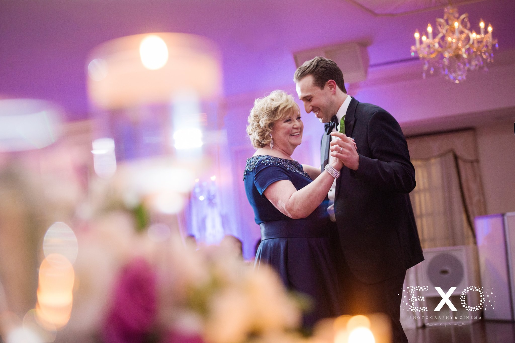 groom and mother dancing at royalton mansion reception