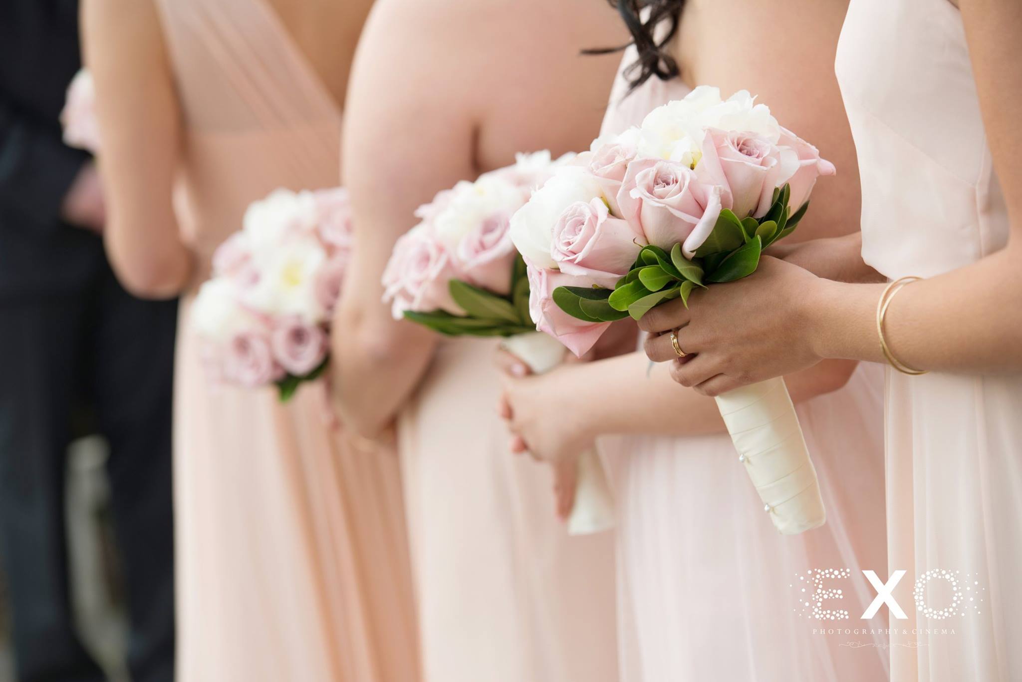 bridesmaids dresses by jenny yoo with florals from pedestals