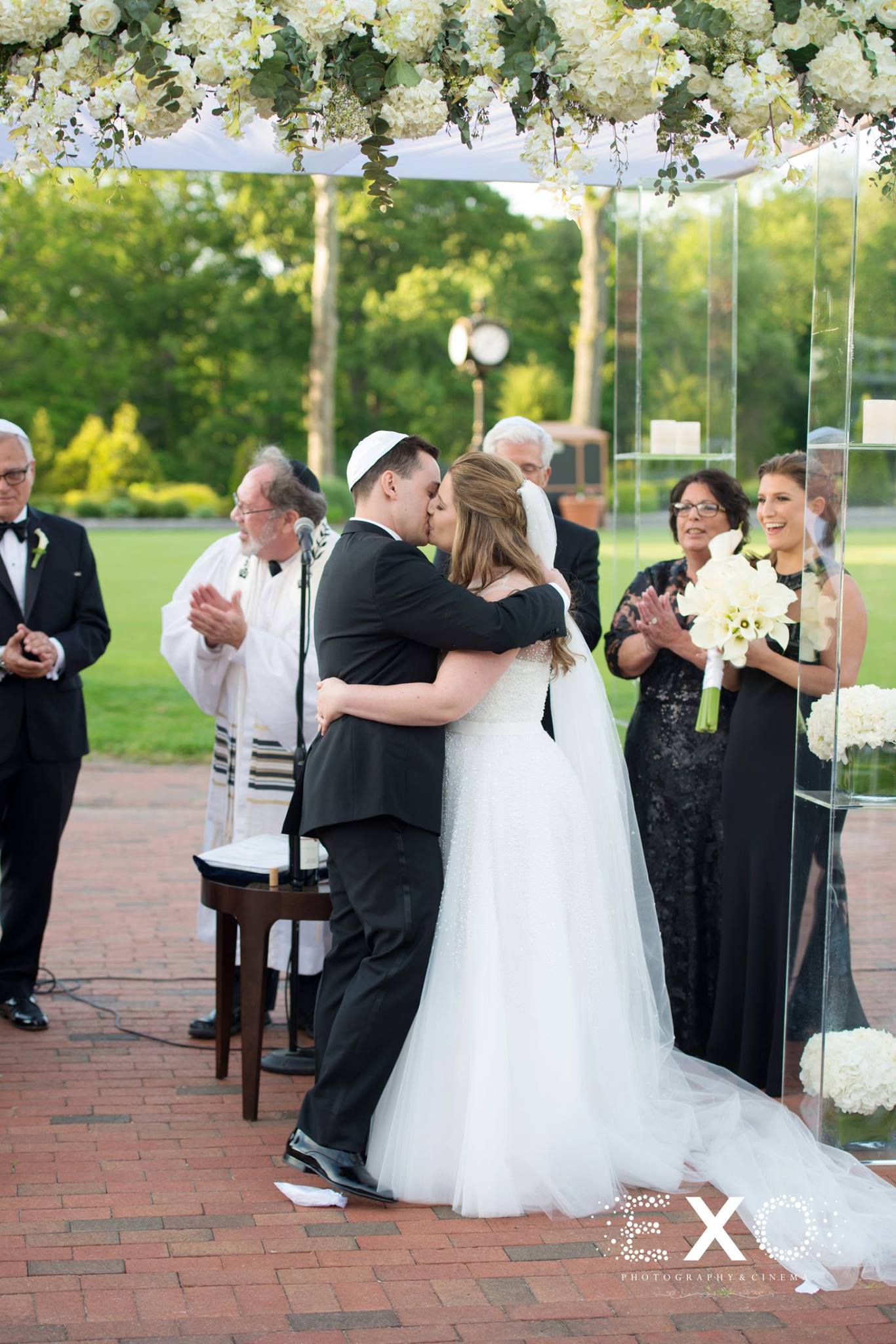 bride and groom kissing after ceremony at Engineers Country Club