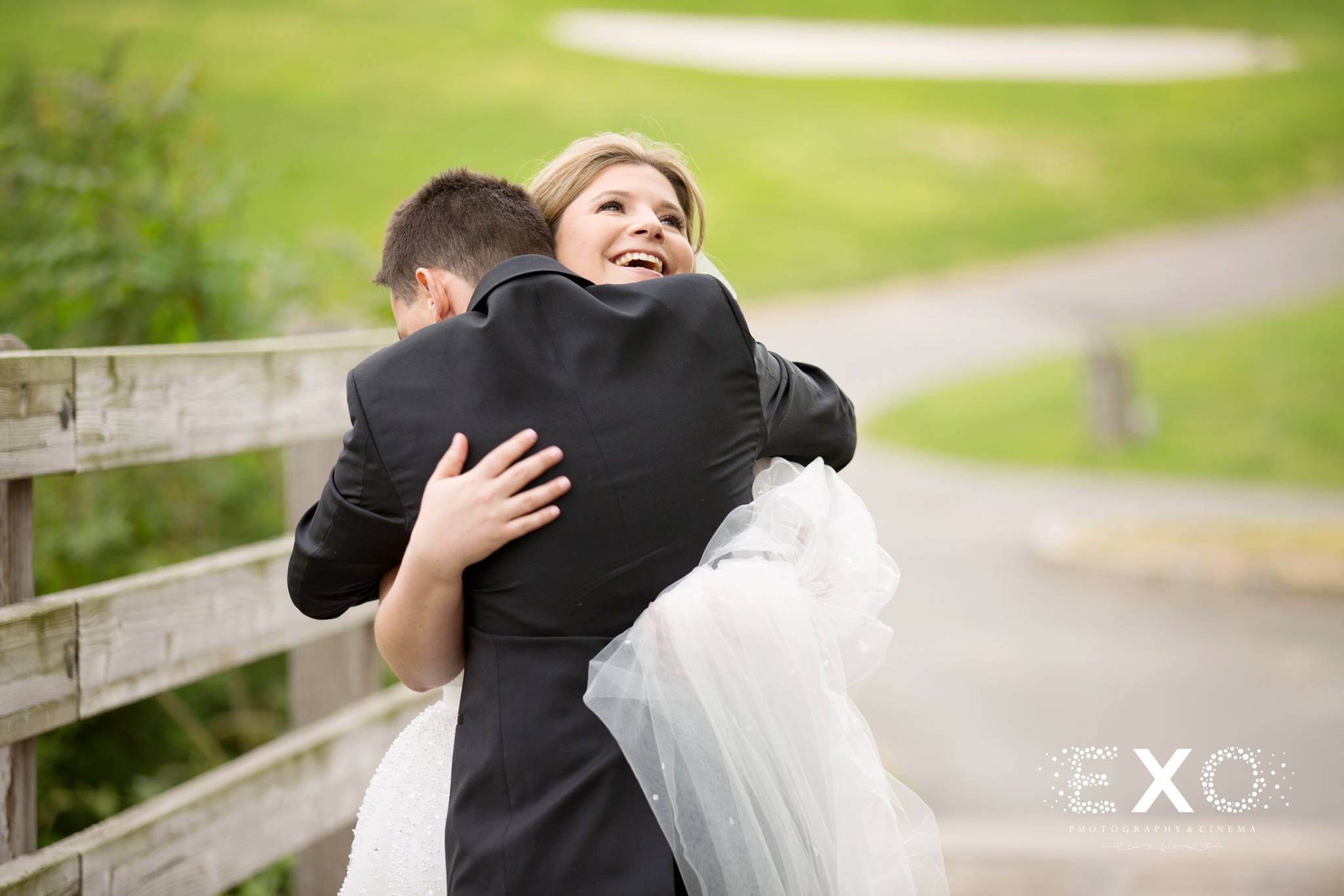 bride hugging groom after first look at Engineers Country Club