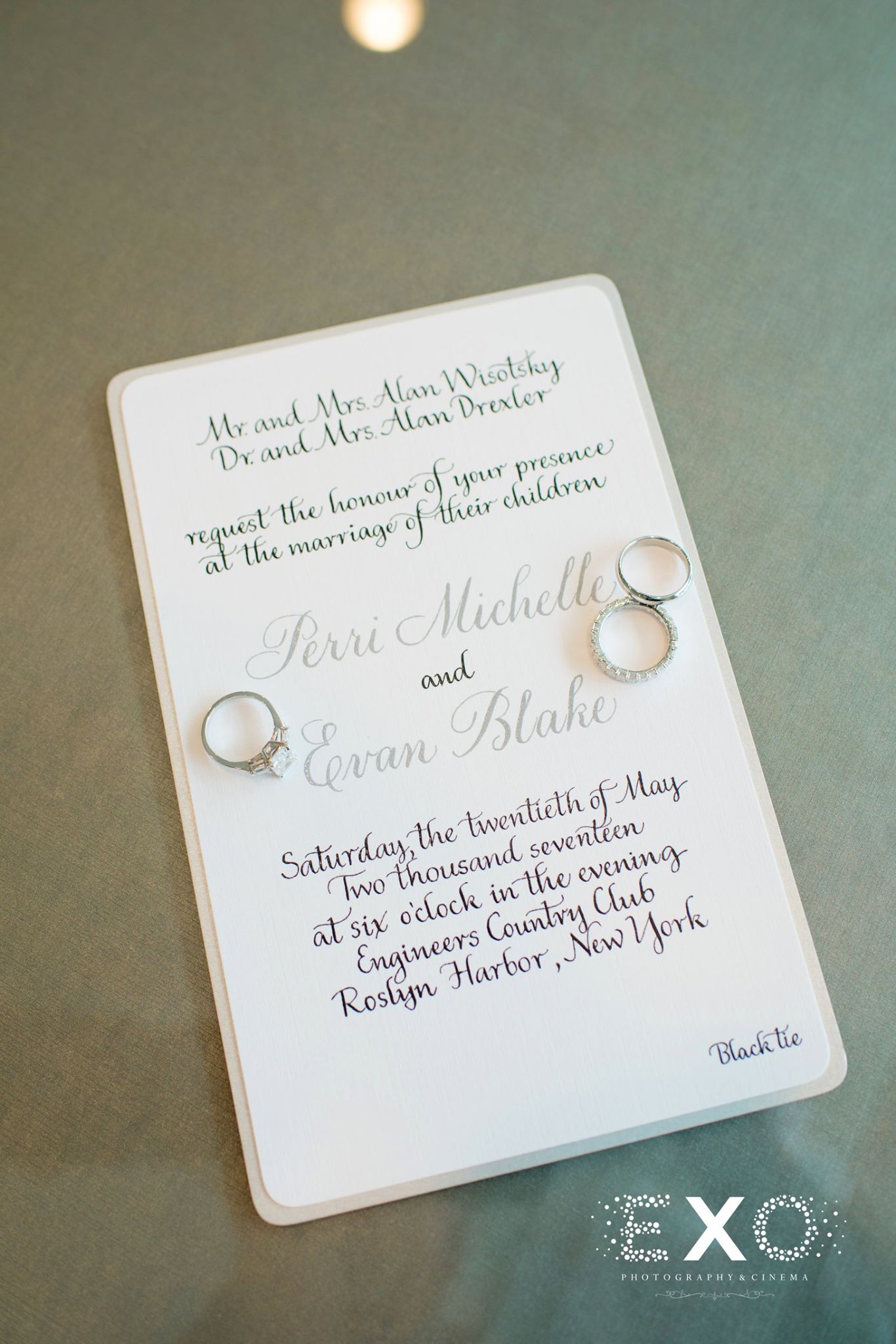 wedding rings by klim jewelry and wedding invitation