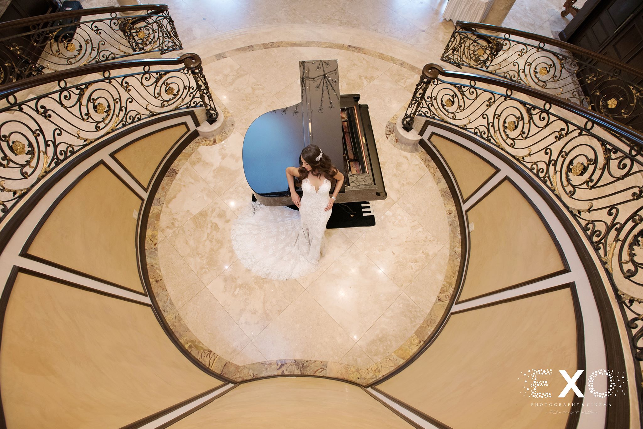 overhead shot of bride in center of stairwell at The Surf Club on the Sound