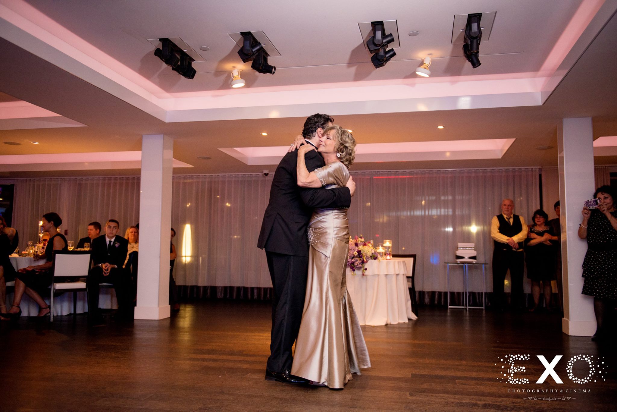groom and mother dancing to music by barratini productions