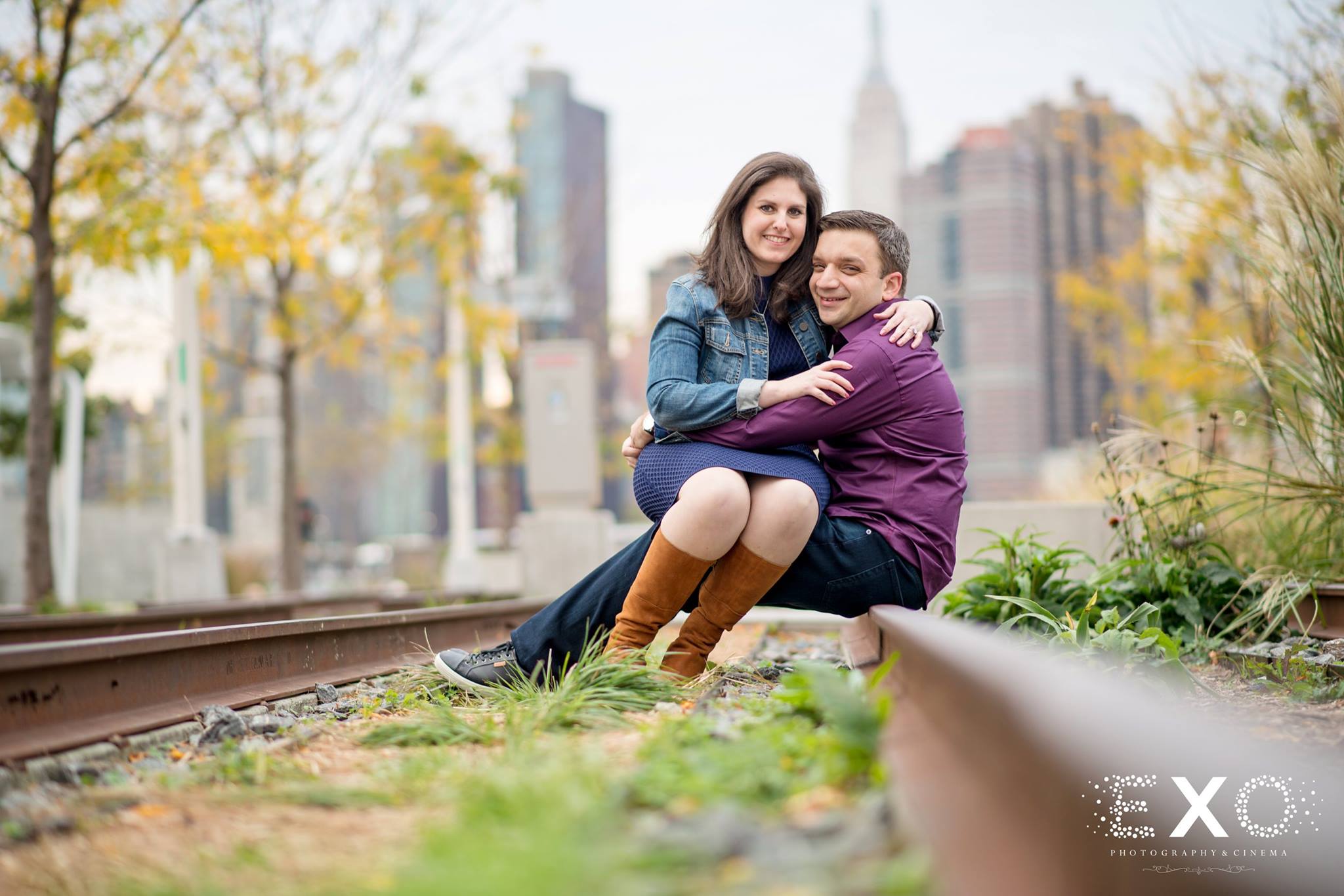 Gantry Park engagement session with couple on railroad tracks