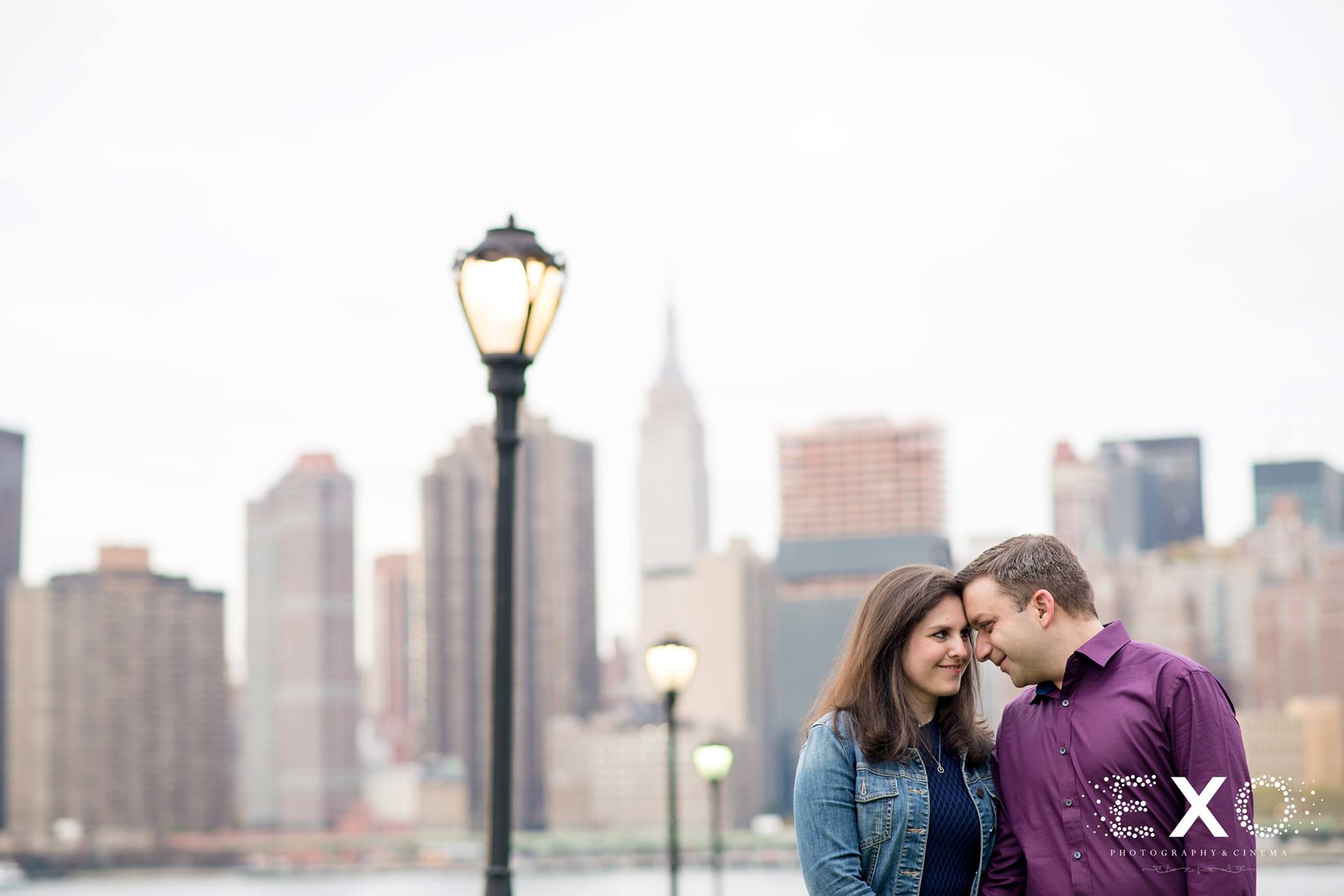 couple together in Gantry Park engagement session