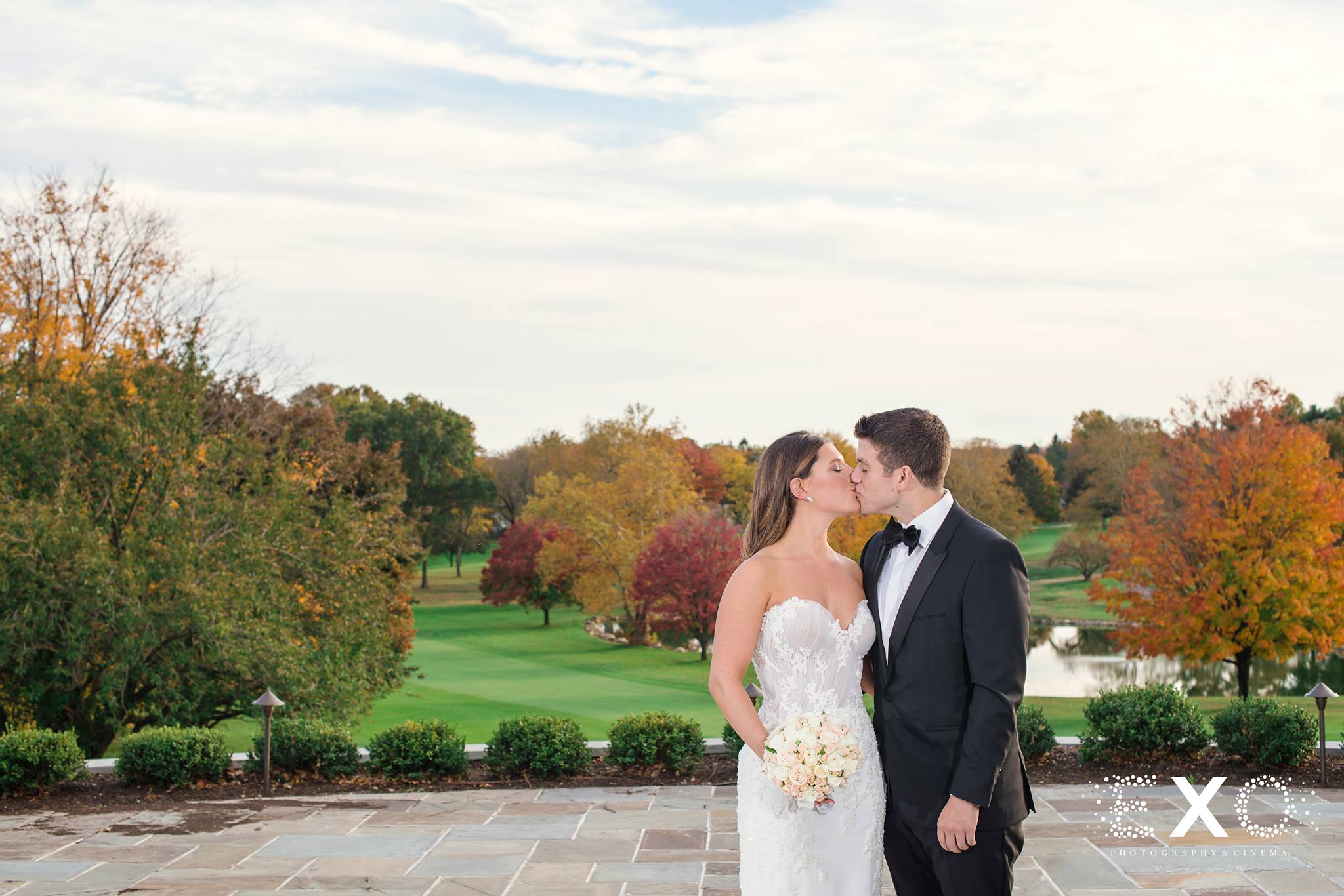 bride and groom kissing at Glen Head Country Club wedding