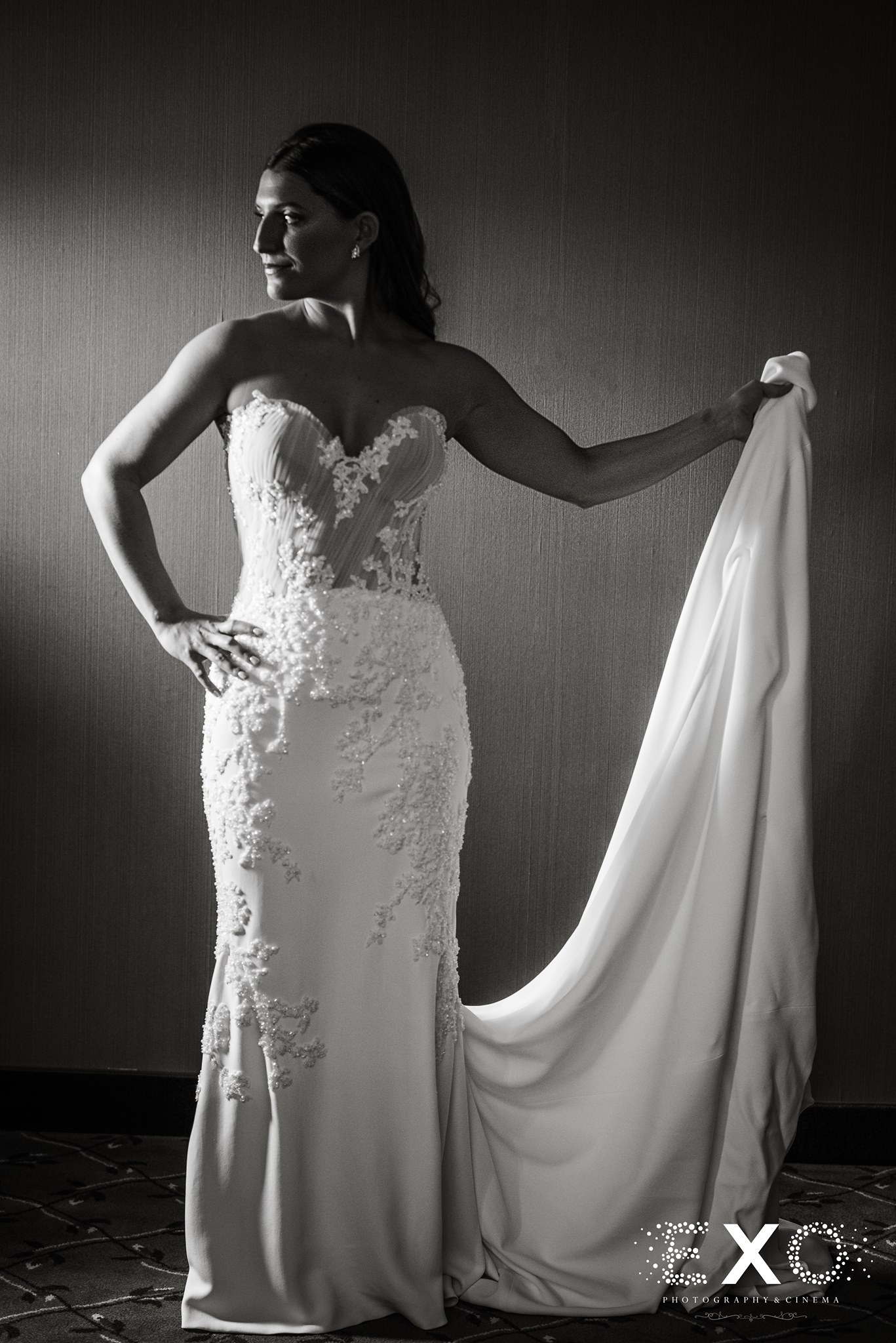 black and white photo of bride in kleinfeld bridal gown designed by mark zunino