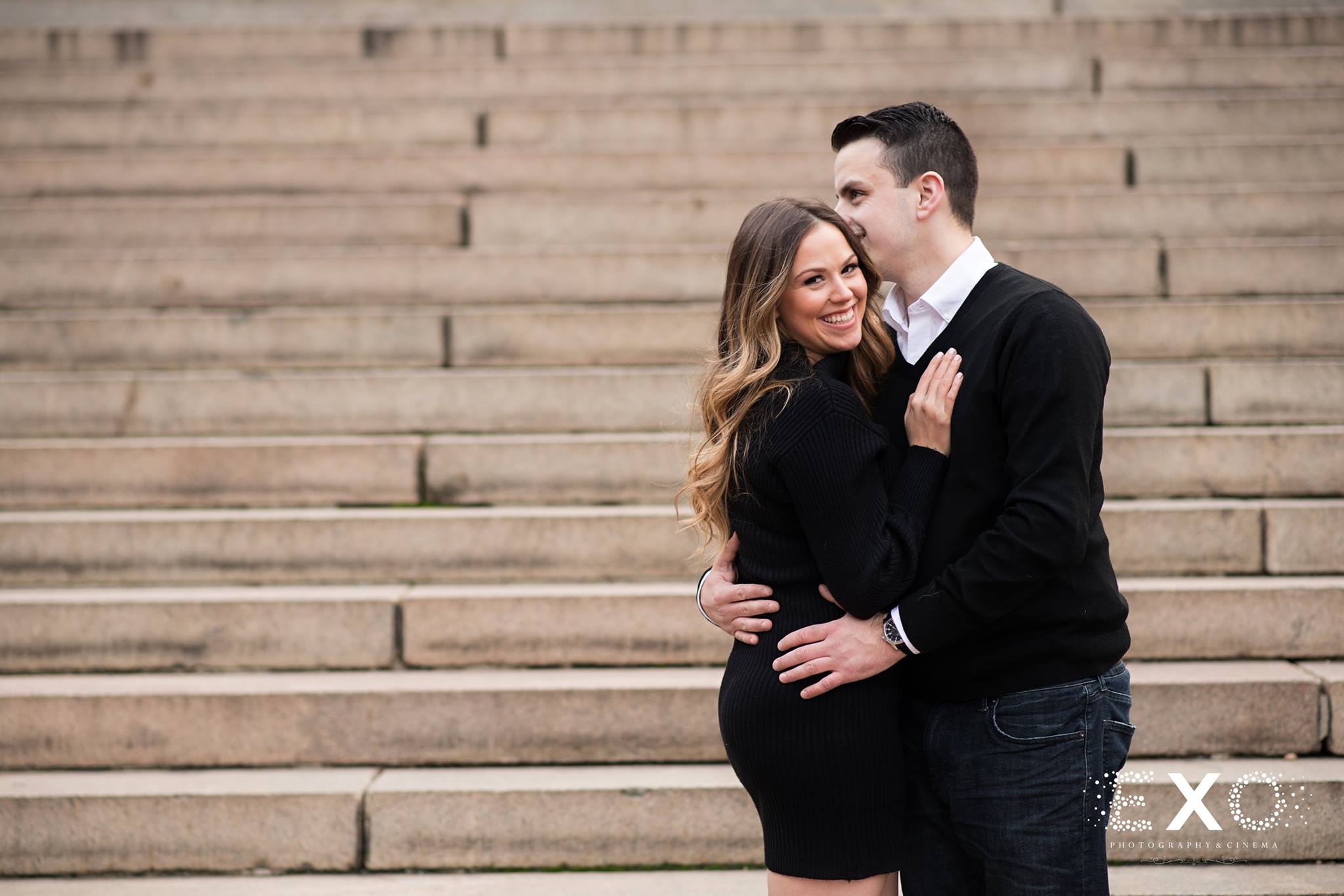 couple near steps at Central Park engagement session