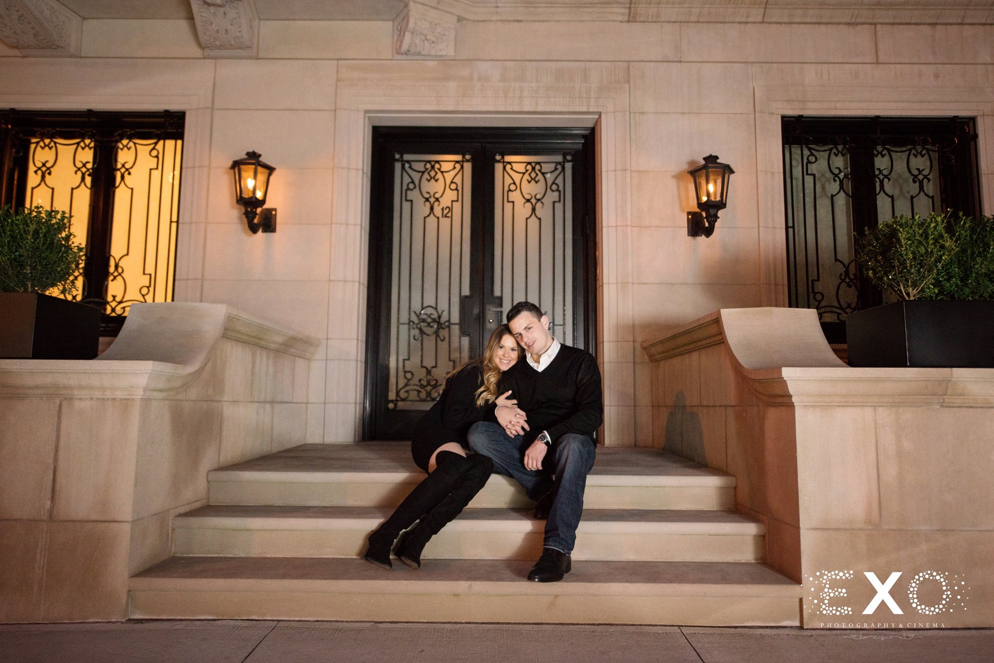 couple standing near building at Central Park engagement session