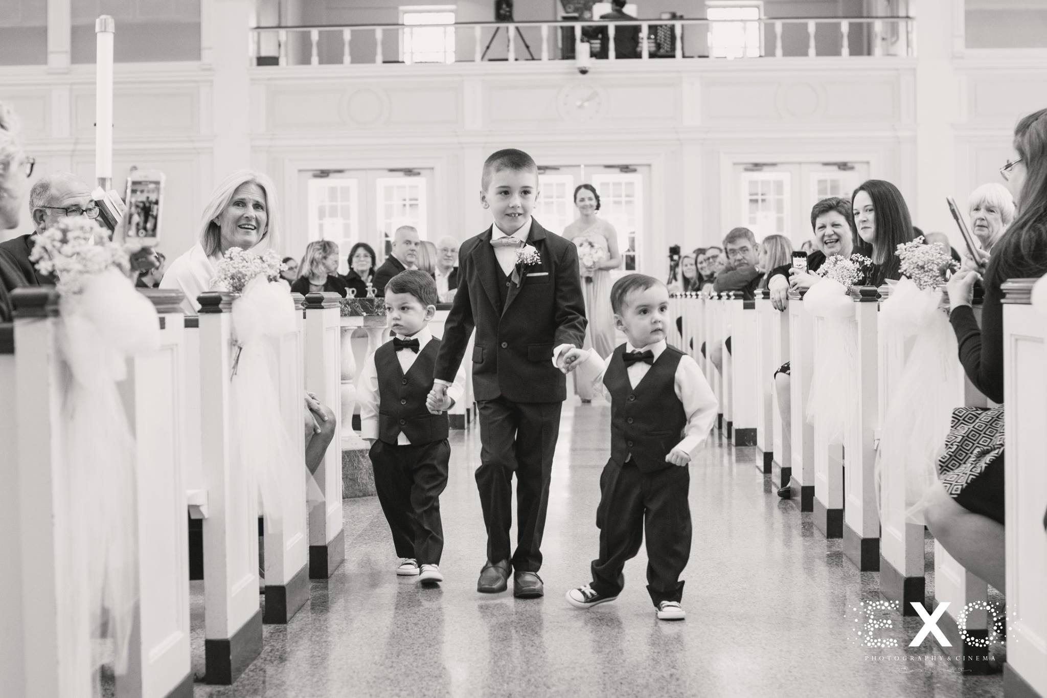 black and white image of young ring bearers during Heritage Club at Bethpage wedding ceremony