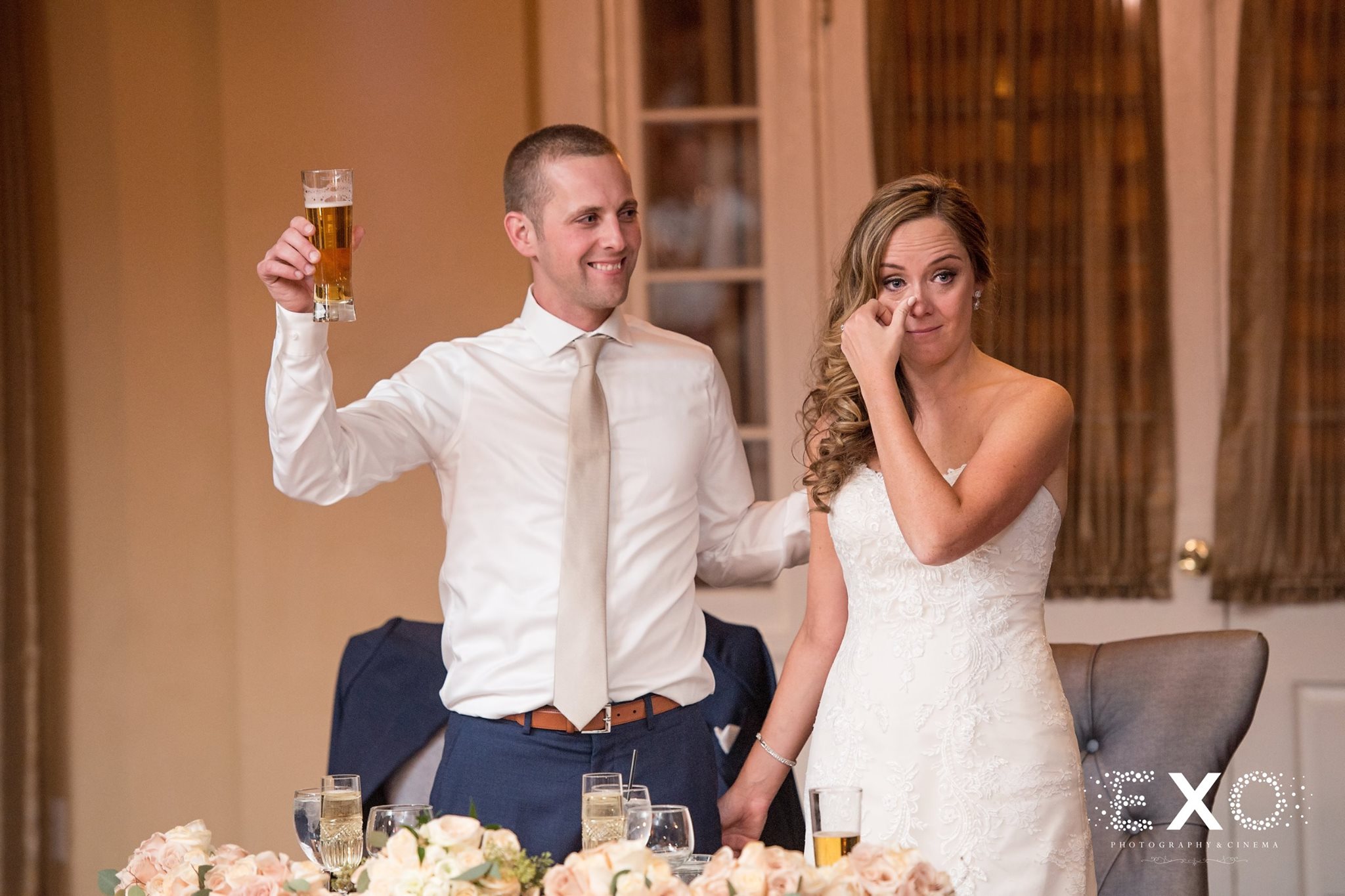 bride and groom toasting during wedding reception at Heritage Club at Bethpage