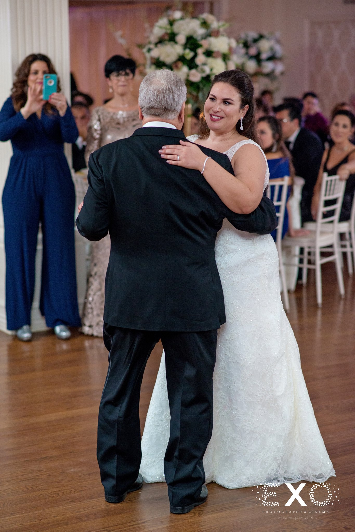 bride and father dancing to music from the Hudson Project
