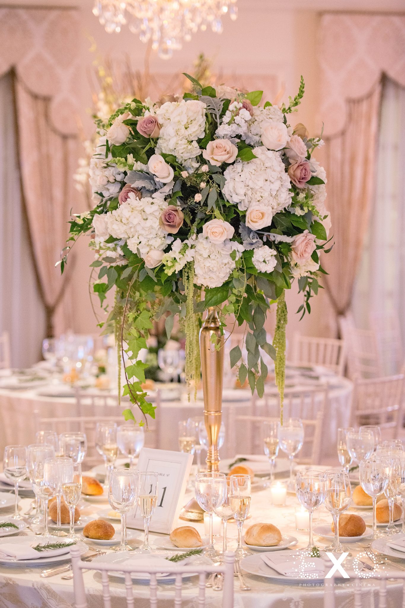 table setting at Royalton at Roslyn Mansion wedding with florals by Pedestals and stationary by J&D Invitations
