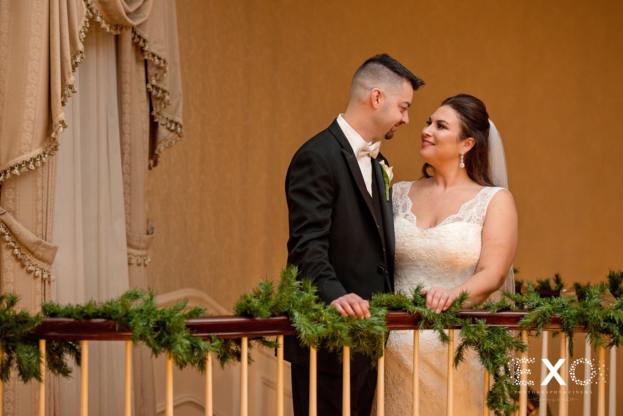 bride and groom looking at each other in Royalton at Roslyn Mansion