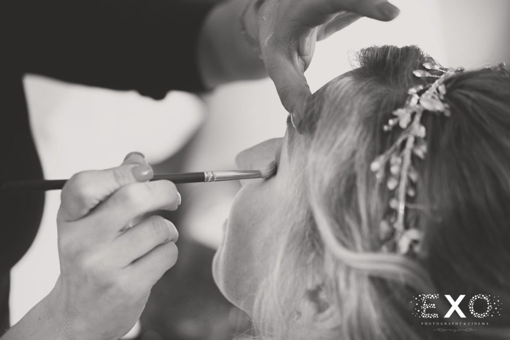 Bride getting her makeup done at The Mansion at Oyster Bay
