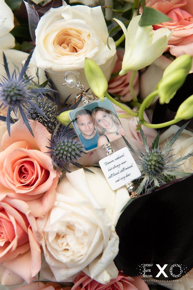 Flowers with old picture of bride and groom