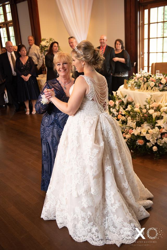 bride and mother dancing at The Mansion at Oyster Bay
