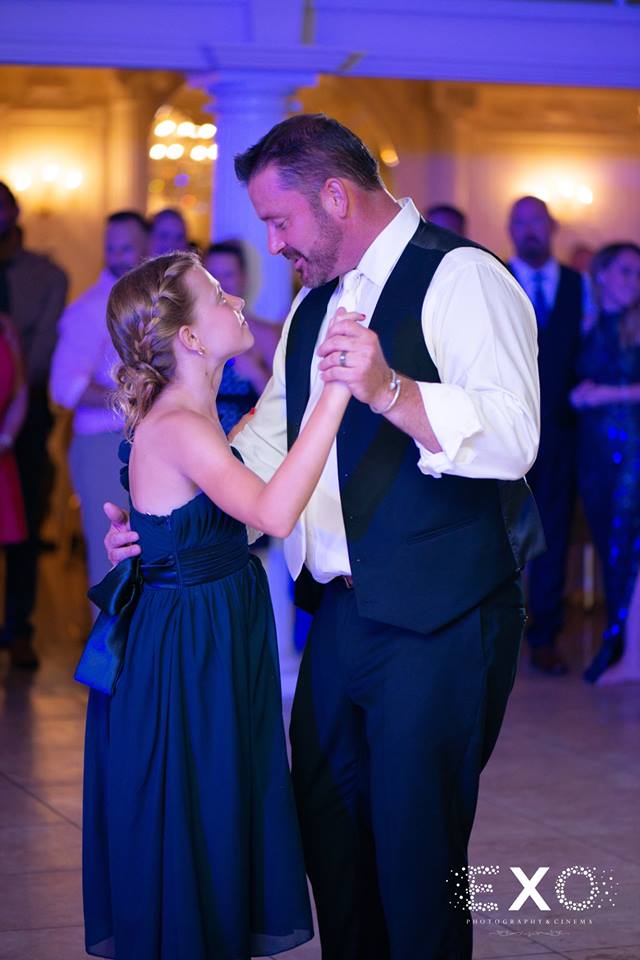 groom dancing with his daughter at Lombardi's on the Bay