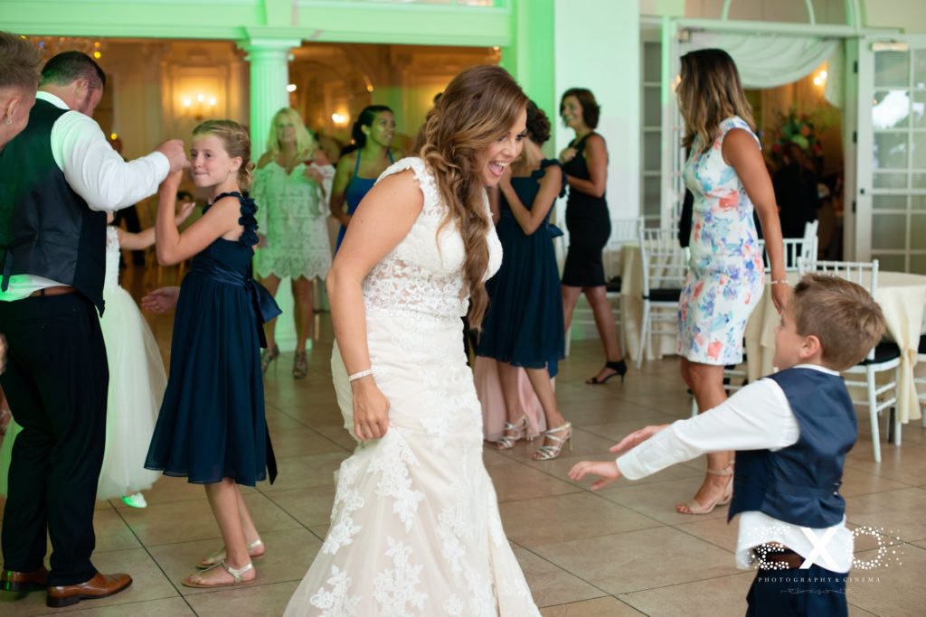 bride and her son dancing at Lombardi's on the Bay