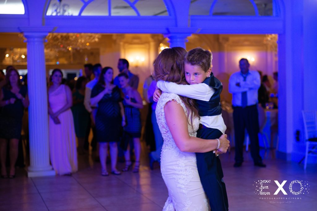 bride and son dancing at Lombardi's on the Bay
